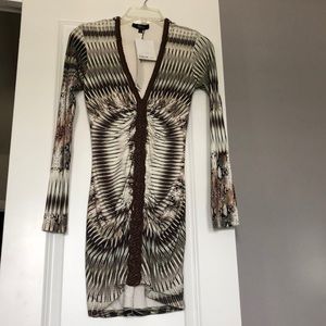 New sky dress with real leather trim.